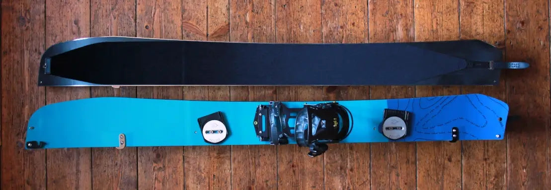 Geteiltes Nordstau Splitboard mit montierter Bindung und Fell